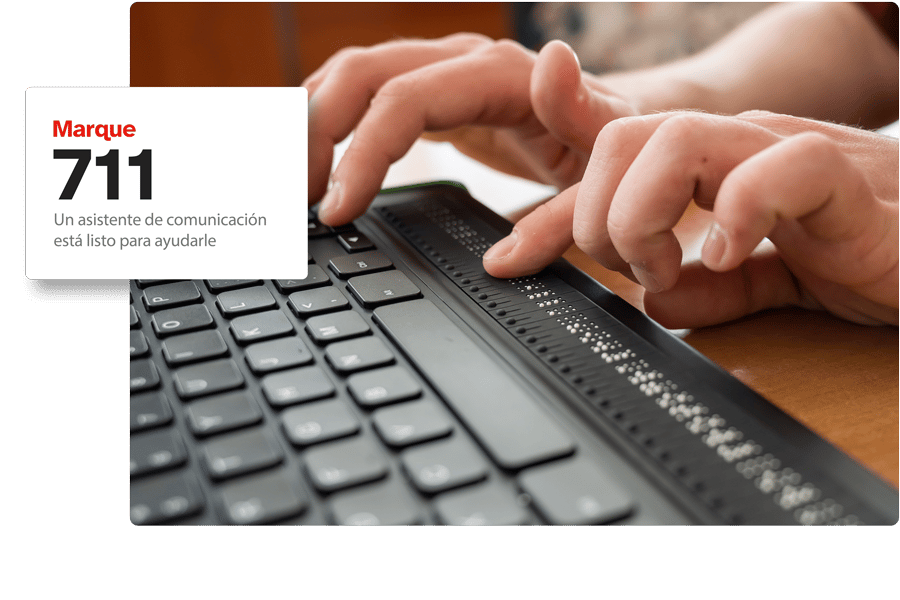 Marcar 711 Usuario ciego tecleando en una tecla telebraille