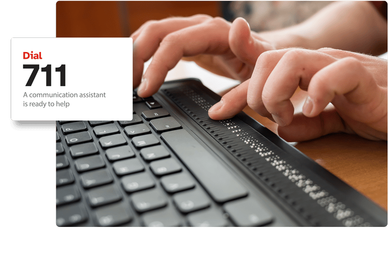 Dial 711 Blind user typing on a telebraille key